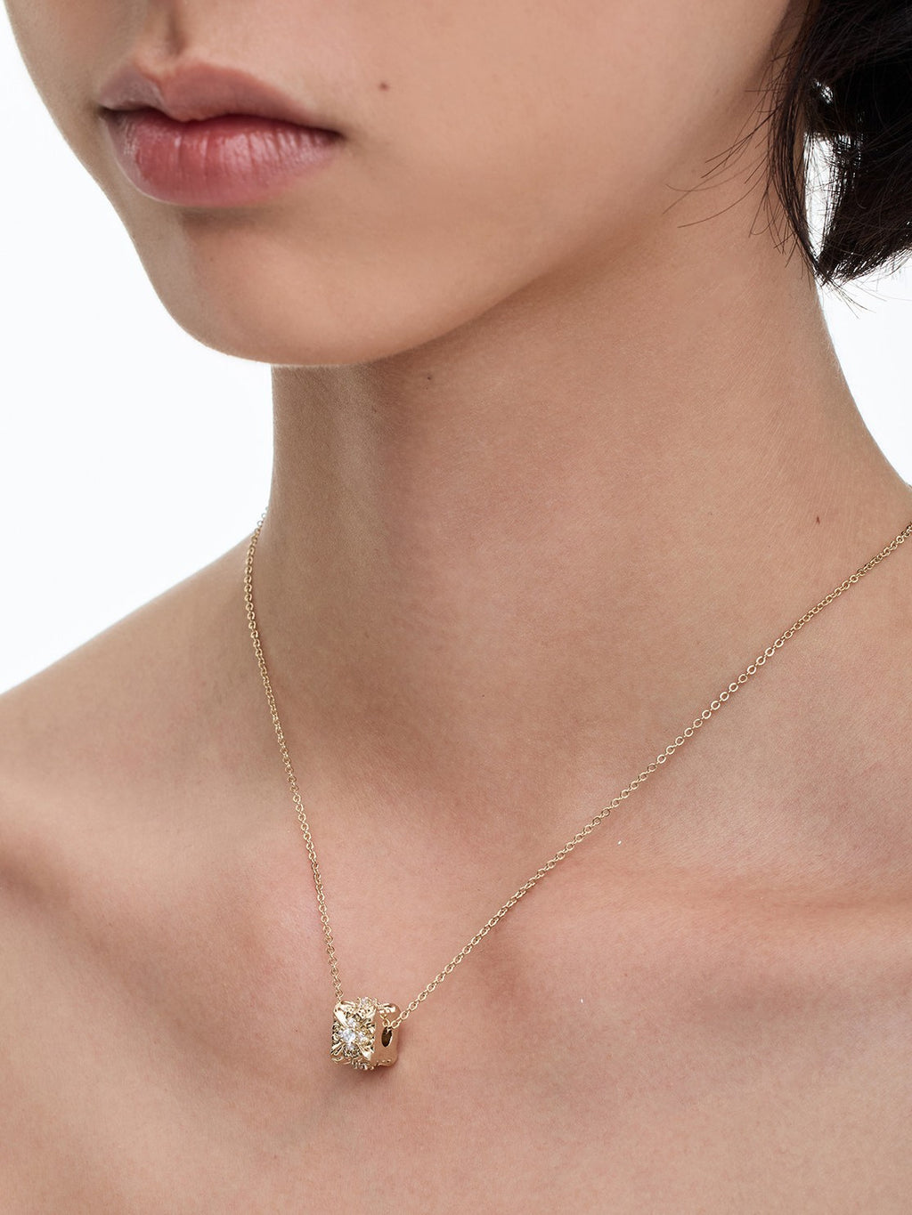 Dear Luma N017 gold iris cube necklace model closeup