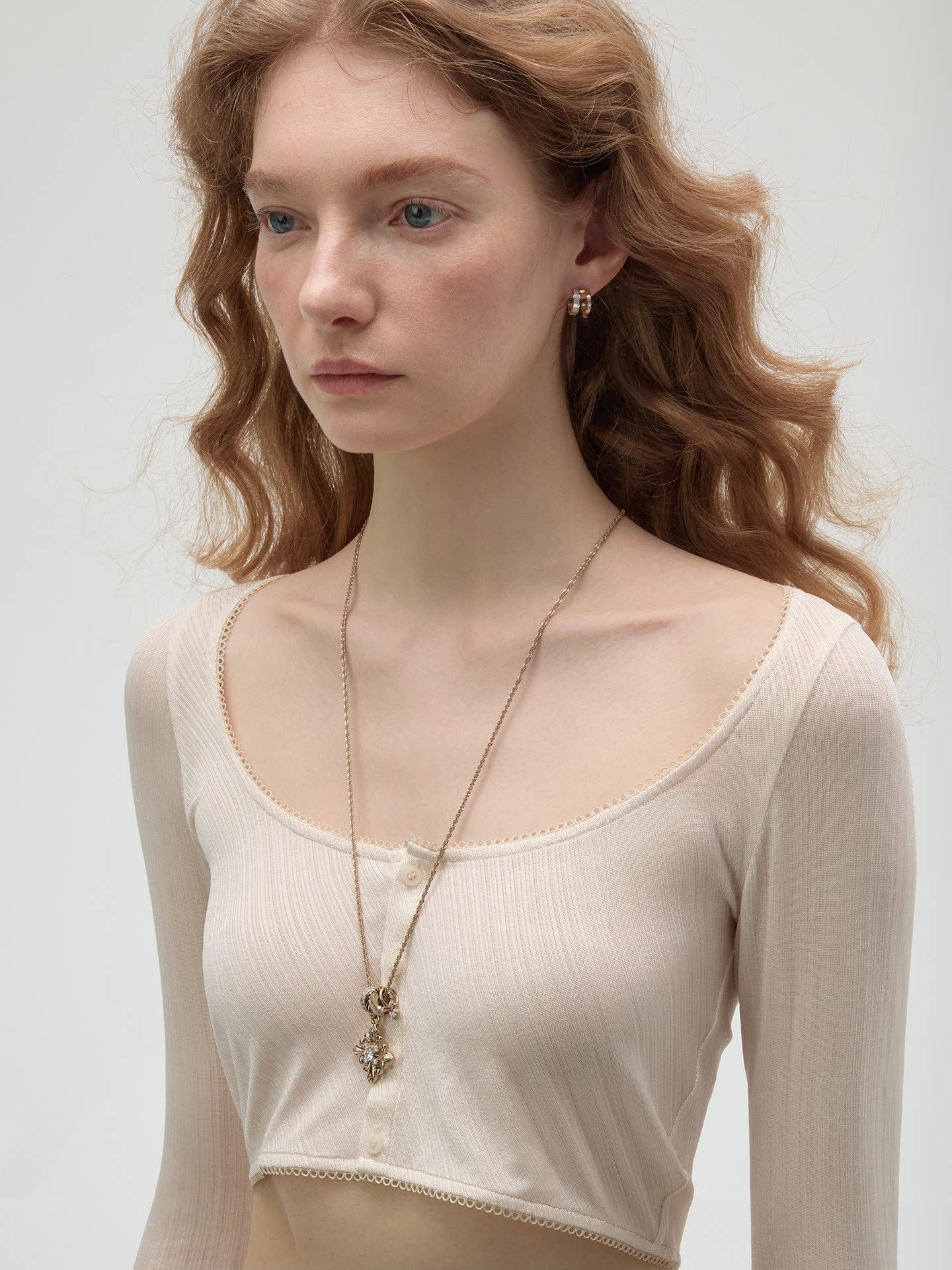 Dear Luma N018 gold iris pendant necklace white background