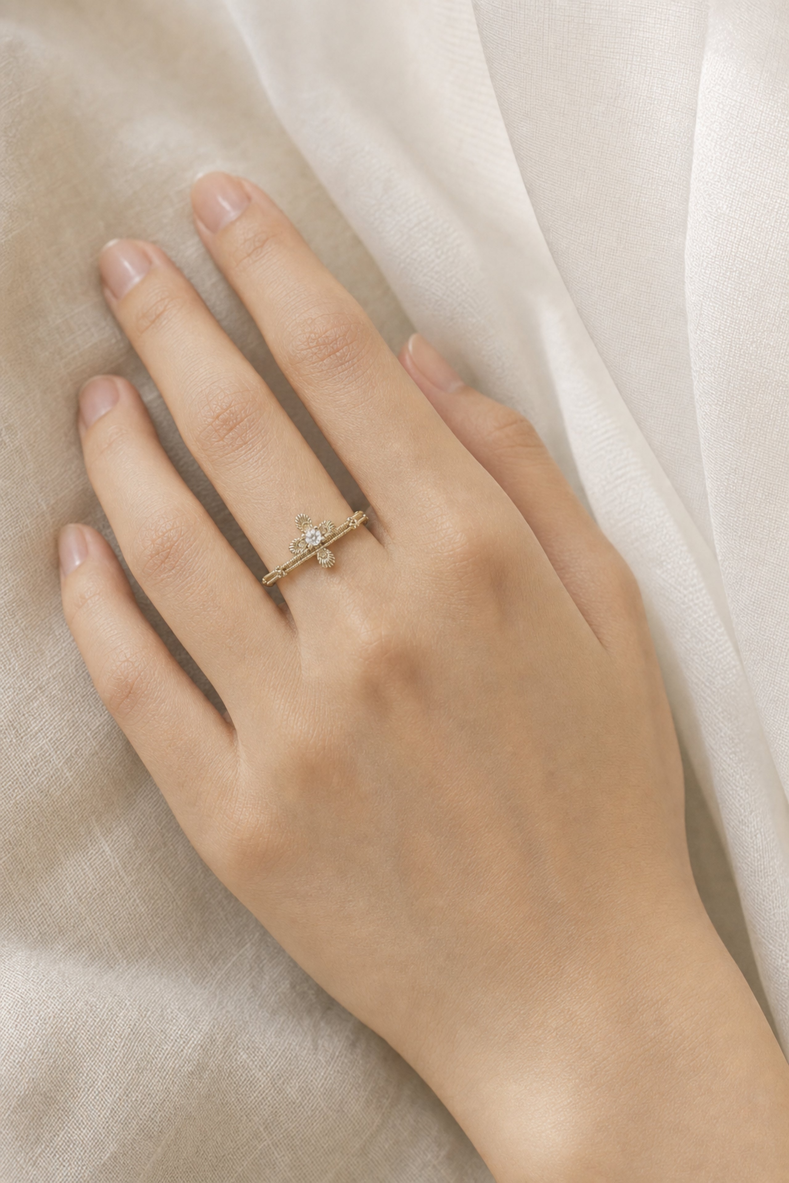 Dear Luma R004 gold lace cross open ring hand closeup