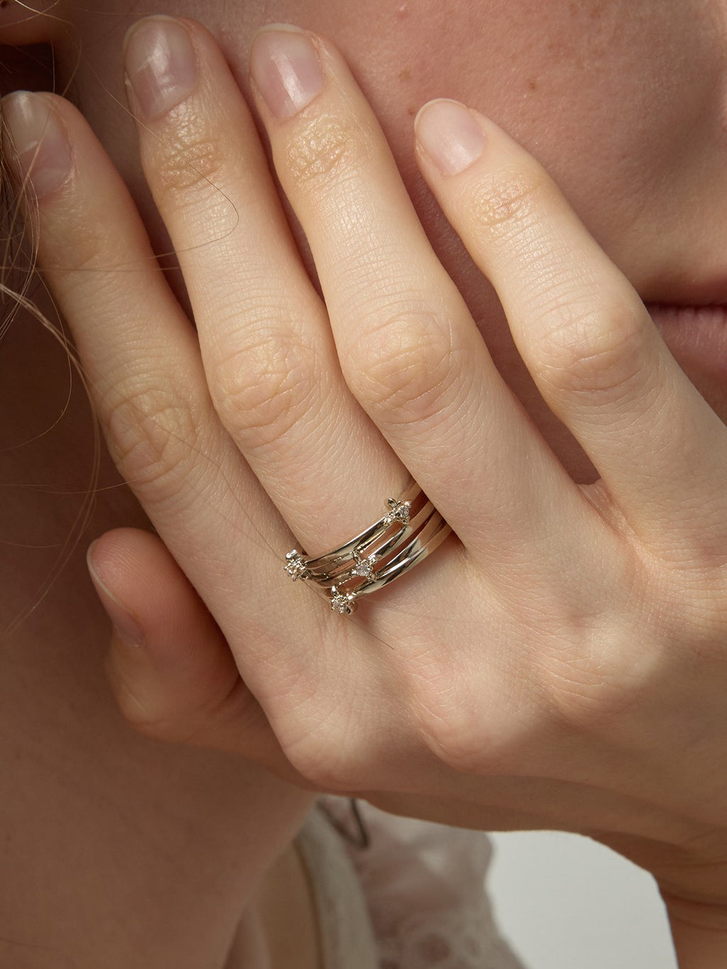 Dear Luma R005 silver multi layer iris ring model closeup