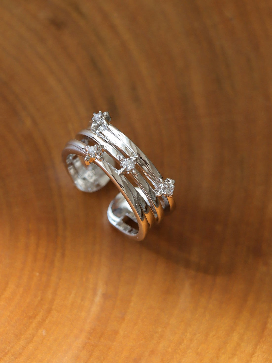 Dear Luma R005 silver multi layer iris ring product detail on wood