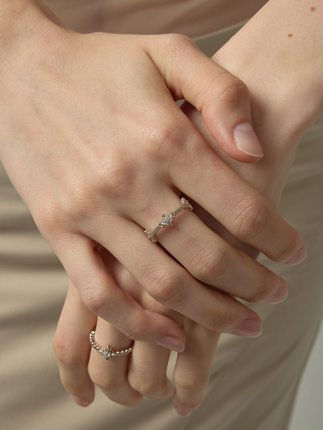 Dear Luma R010 gold iris ring set front wearing detail